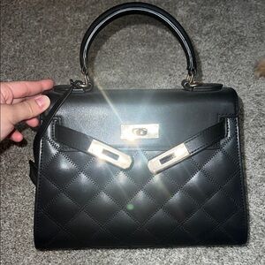 Black Quilted Top-Handle Satchel with Gold Hardware